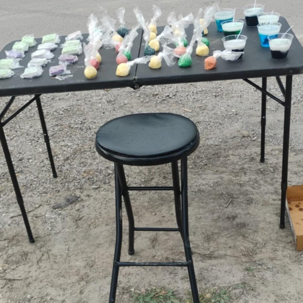 Homemade water candles, bath bombs, and bar soaps.